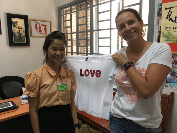 Marilyn Nichols with student in Cambodia