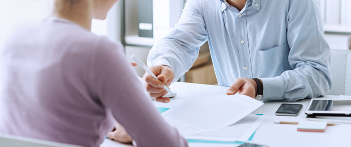 Rehiring Former Employees Can Be Advantageous A man interviews a job candidate.