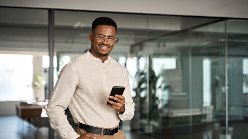 Manager using HCM self-service app on phone to approve time off requests