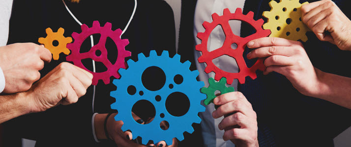 The Complexities of Merging Payroll Systems During MA A payroll manager discusses an upcoming merger with her new team members