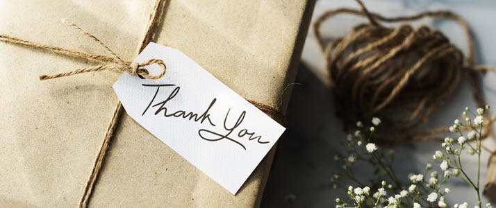gift box simply wrapped with thank you on tag