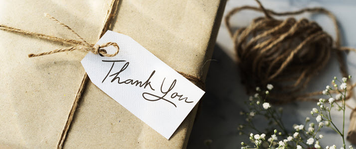 gift box simply wrapped with thank you on tag gift box simply wrapped with thank you on tag