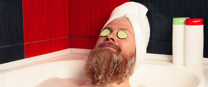 bearded man enjoying his compensation packages which includes spa Stop Thinking About Compensation Packages as Just Pay and Benefits