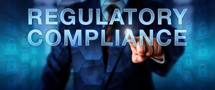 Man using touch screen of words Regulatory ACA Compliance Graphic image of man using touch screen of words Regulatory ACA Compliance