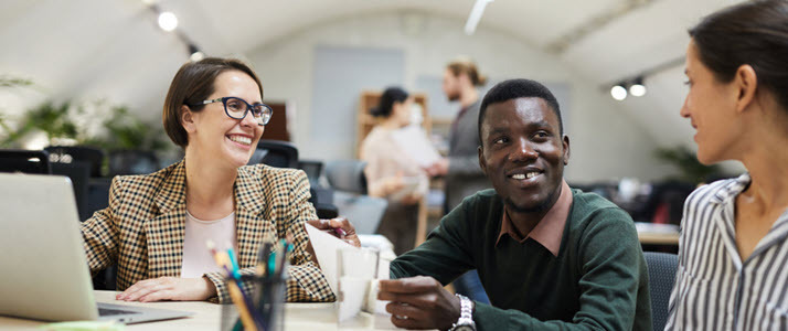 diverse group of office workers smiling