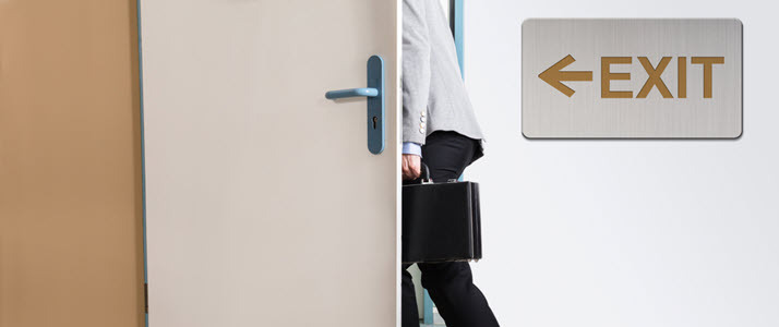 How People Analytics Can Help Reduce Turnover Employee with briefcase walking out exit door