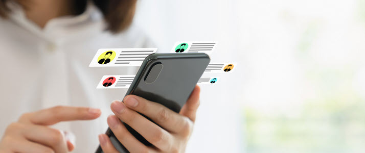 woman holding smart phone scanning peer reviews woman holding smart phone scanning peer reviews