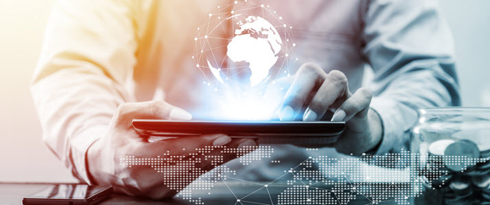 How Technology Empowers Global HR graphic showing man with tablet global map overlay