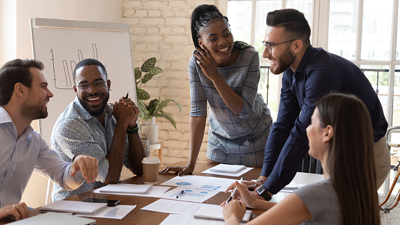 group of multiethnic workers at work training smiling group of multiethnic workers at work training smiling