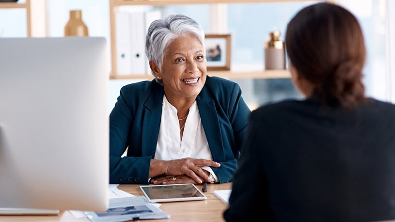 Female senior team manager meeting with female job applicant Female senior team manager meeting with female job applicant