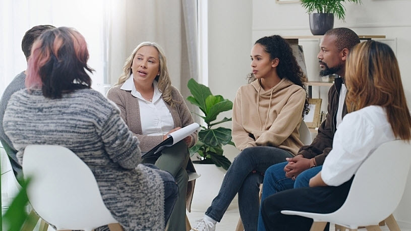 Diverse group of employees in a casual office meeting Diverse group of employees in a casual office meeting
