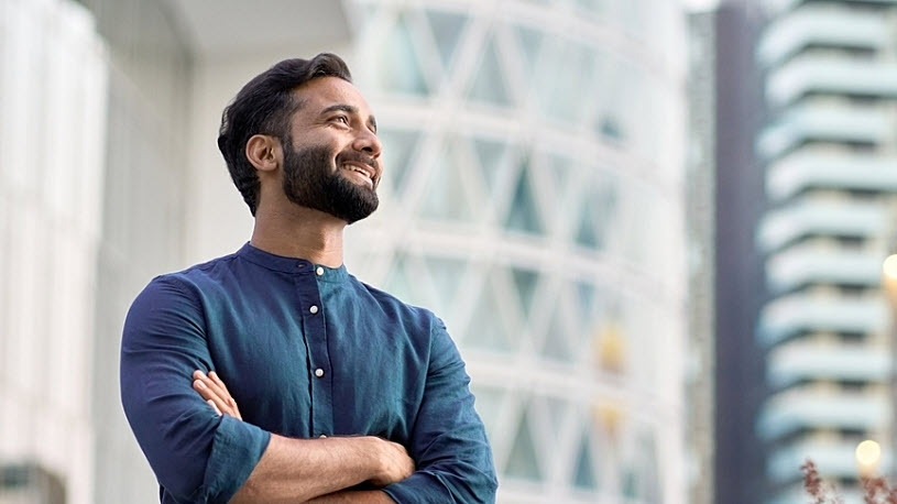 happy businessman outside looking ahead to the future happy businessman outside looking ahead to the future