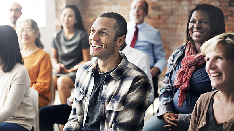 group of multiethnic workers at work training smiling group of multiethnic workers at work training smiling