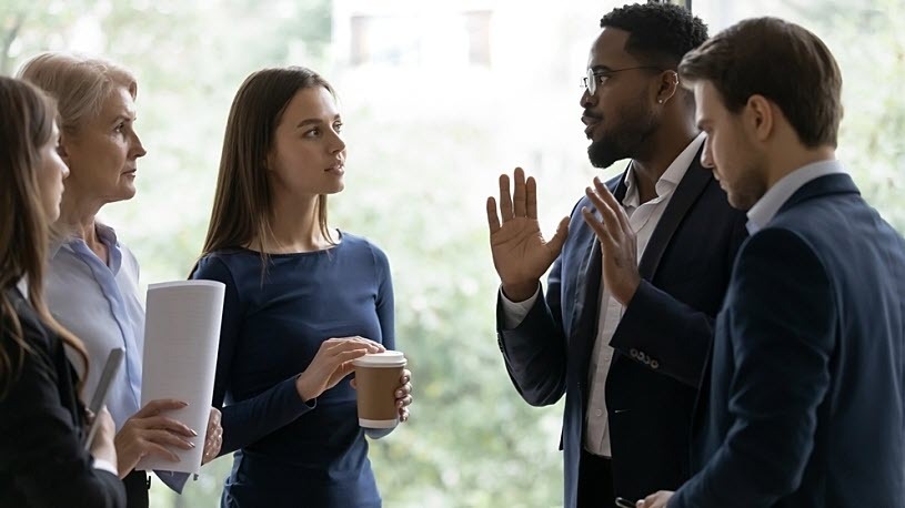diverse business team It's Time to Question the Intelligence of Your Human Capital Management System