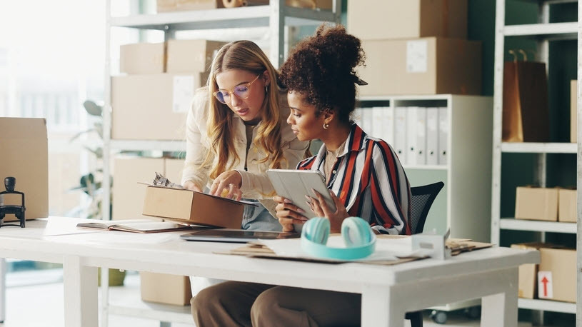 Small business owners preparing website order Unpacking The Small Business Owner's Toolkit