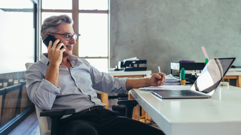 A businessman on the phone checking references of a job applicant A Checklist for Conducting Reference Checks