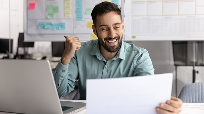 business owner reviewing background check results at desk Double-Check Your Background Check Process