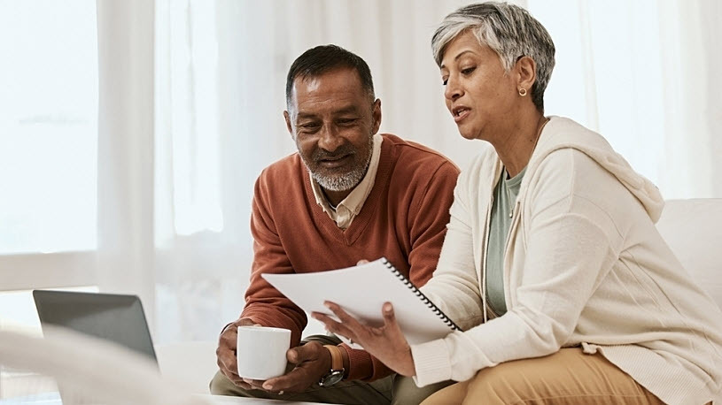 Senior couple reviews Roth retirement plan contribution options Senior couple reviews Roth retirement plan contribution options
