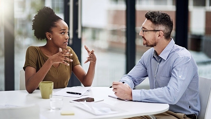 two coworkers discussing POP and HRA plan differences