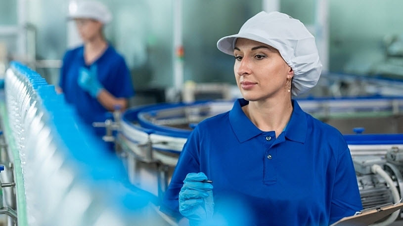 Caucasian female industry worker team working in warehouse