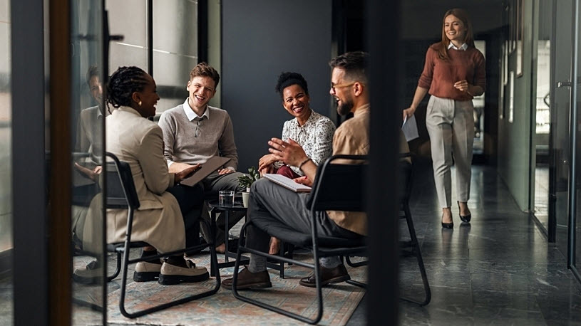 A group of diverse collegues brainstorming in the office