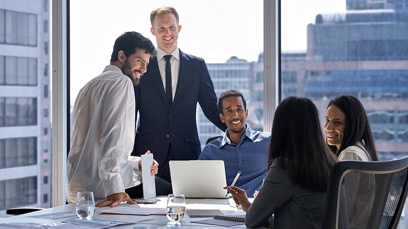 Four people meeting at work
