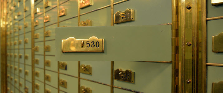 image of safety deposit boxes in bank vault