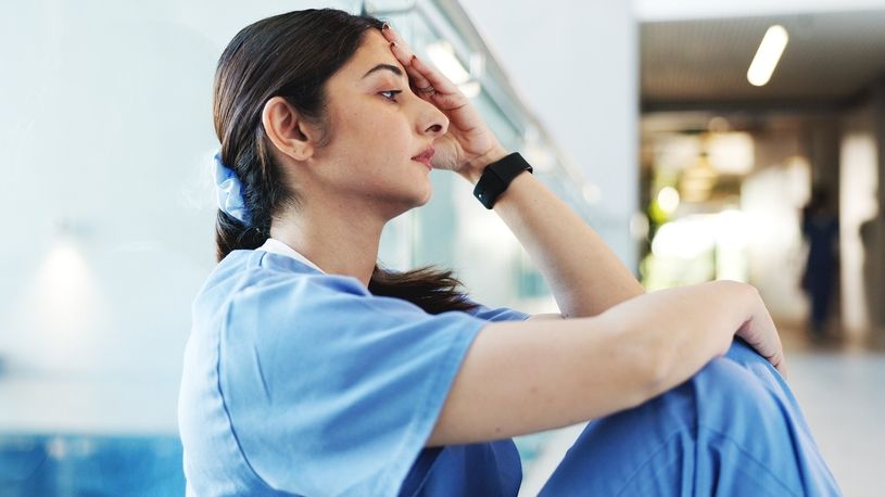mentally exhausted medical professional taking a break
