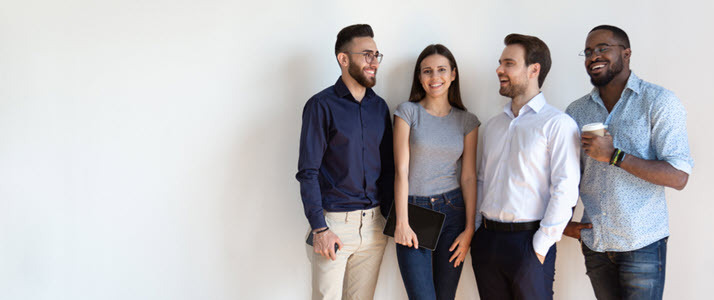 Four diverse young business people