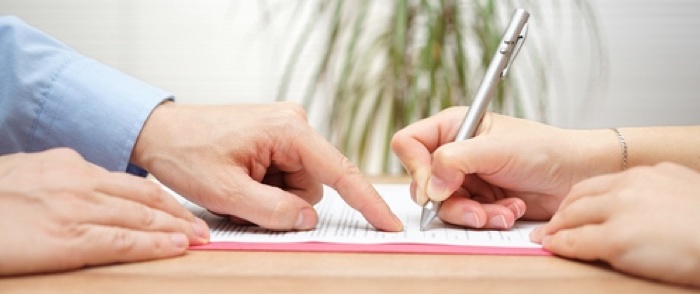An employee signs a separation agreement.