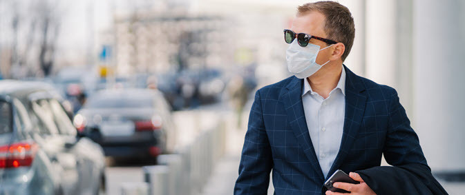 businessman wearing paper mask and sunglasses businessman wearing paper mask and sunglasses