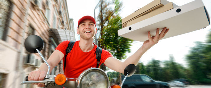 guy delivering pizzas on motorcycle guy delivering pizzas on motorcycle