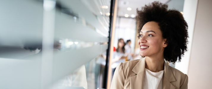 Playing Fair With Equal Pay Young woman in a modern workplace