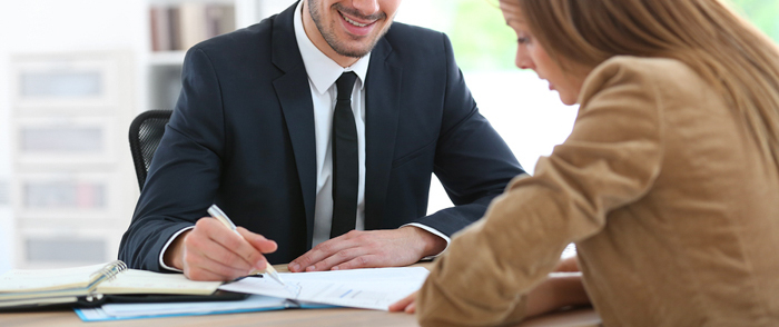 Two people talking in an office