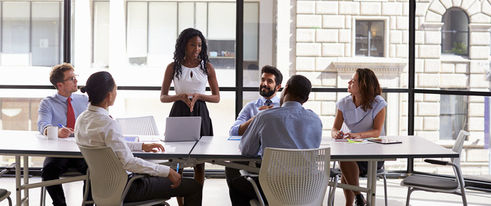 An HR leader talks with a finance team about employee wage garnishments.