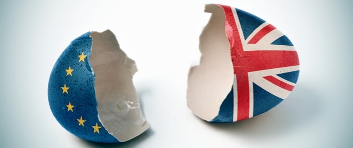 An egg shell is split into two halves which are painted to represent the EU and Britain