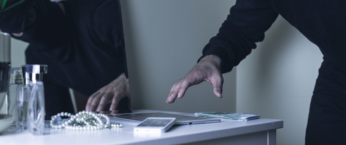 Data Security A man enters a building attempting to steal data.