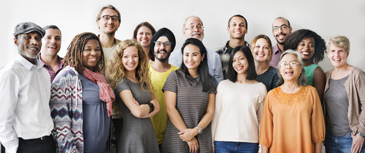 A diverse group of people smiling A diverse group of people smiling