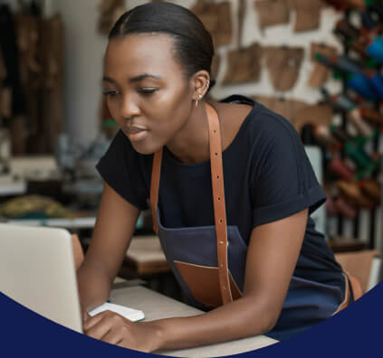 Woman looking at laptop screen