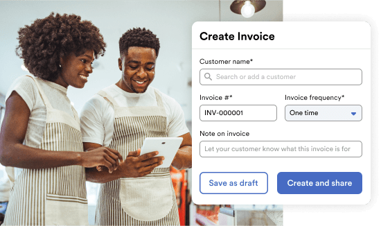 Two shop owners create and review invoice details on a tablet with invoice form overlay