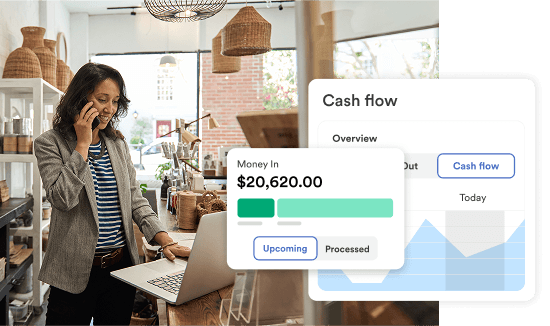 Business owner checks cash flow dashboard showing incoming revenue on laptop