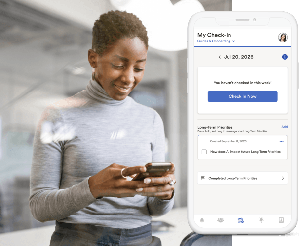 Person viewing a workforce management mobile application that enables weekly check-ins, guided onboarding, and long-term priority tracking, helping organizations improve employee engagement and development.