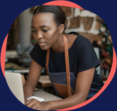 Woman looking and working on her laptop